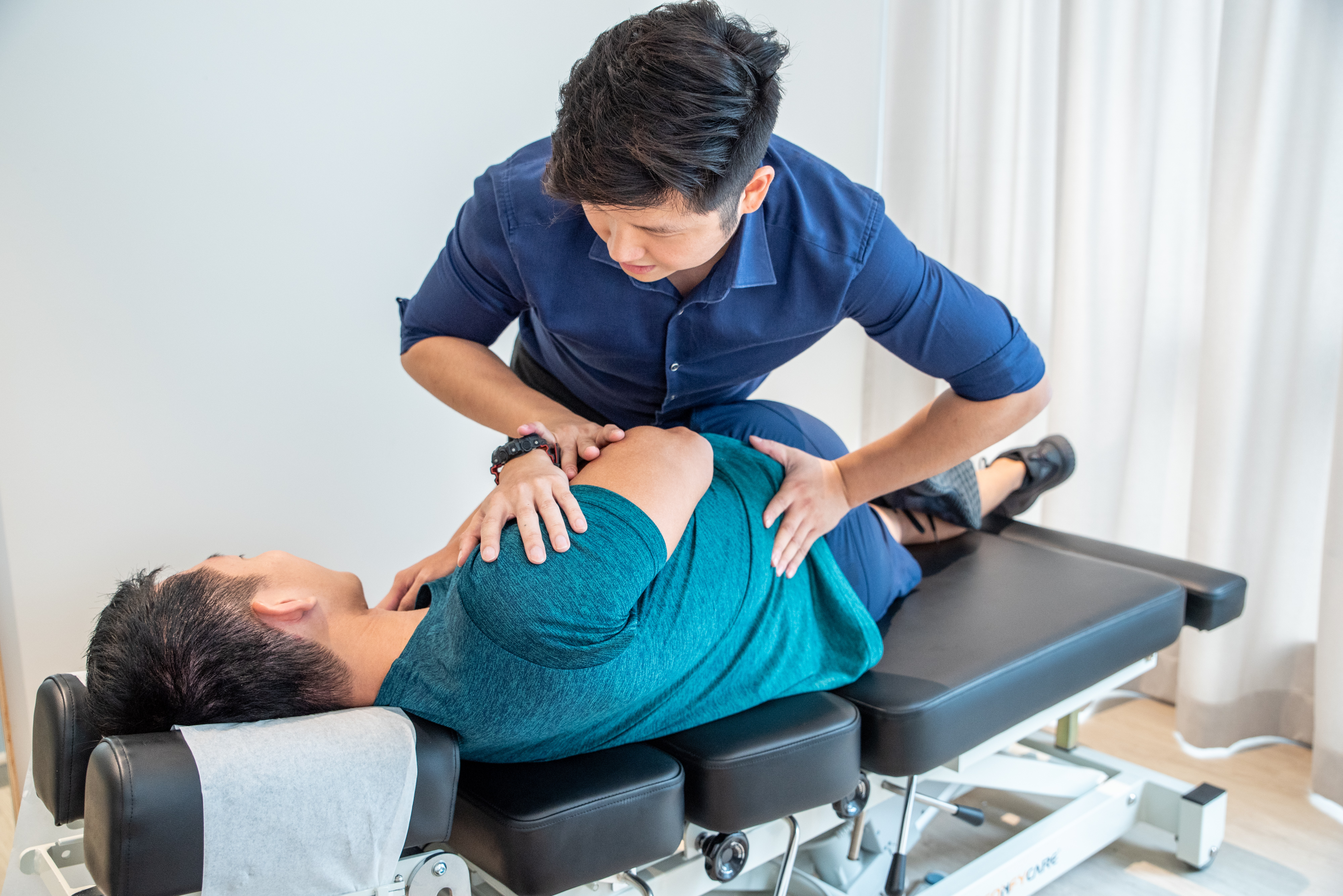 Dr. Tim performing adjustment